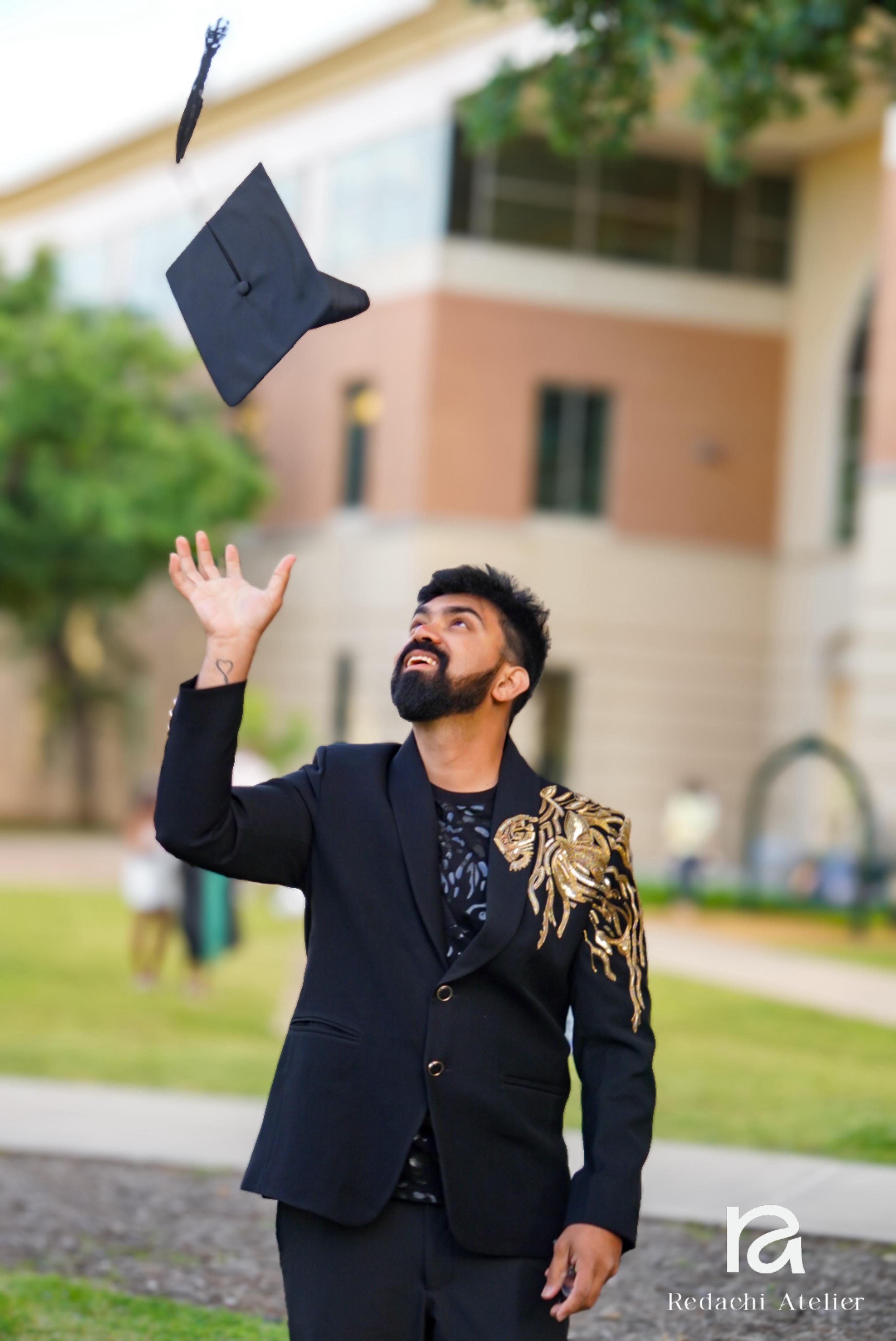 Client Chaitanya on graduation day in Dallas, wearing a Redachi Atelier blazer with gold shoulder embroidery